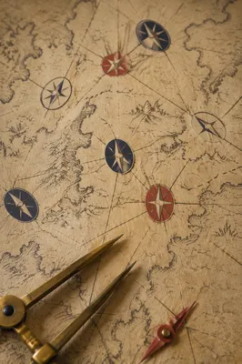 Abstract Compass Navigation on Aged Parchment