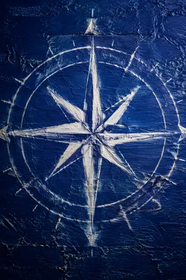 White Compass Rose on Ocean Blue Canvas