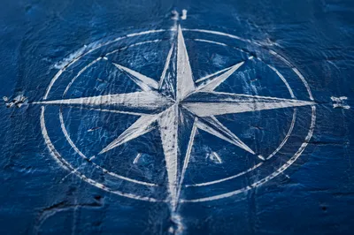 White Compass Rose on Ocean Blue Canvas