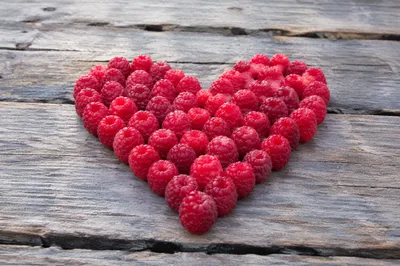 Red Raspberry Heart on Rustic Wood
