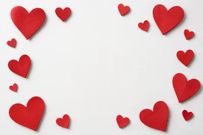 Red Paper Hearts on White Background