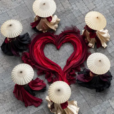 Crimson Heart Ribbons with Elegant Parasols