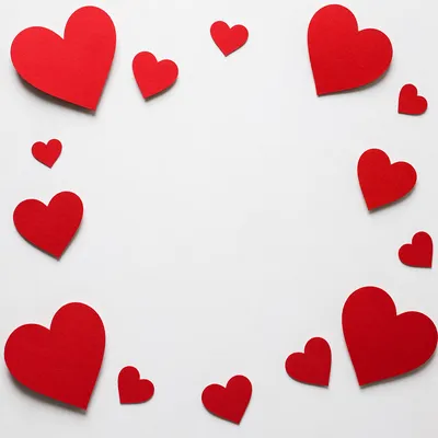 Red Paper Hearts on White Background