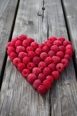 Red Raspberry Heart on Rustic Wood