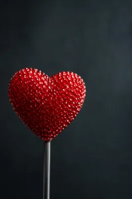 Red Heart Ornament on Dark Background