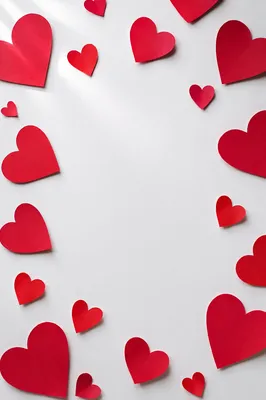 Red Paper Hearts on White Background