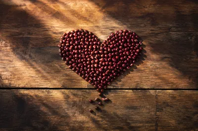 Red Bean Heart on Rustic Wood