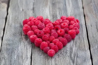 Red Raspberry Heart on Rustic Wood