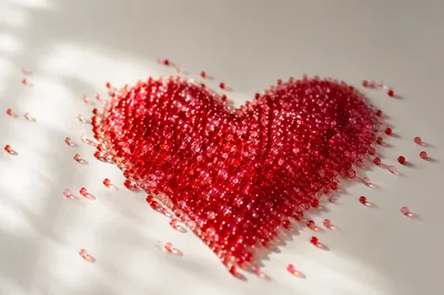 Red Glass Bead Heart on Cream