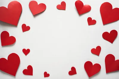 Red Paper Hearts on White Background