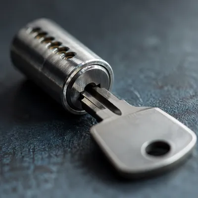 Metal Key in Lock Security Close Up