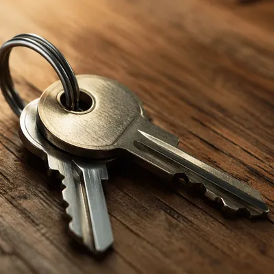 Macro Metal Keys on Wooden Table
