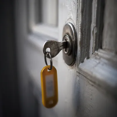 Worn Key in Door Lock Close Up
