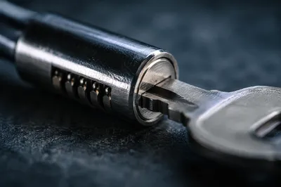 Macro Metal Key in Lock Security Concept