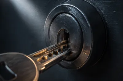 Brushed Metal Key in Steel Lock