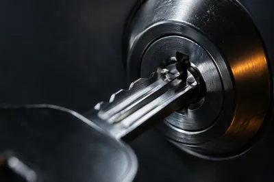 Brushed Metal Key in Steel Lock
