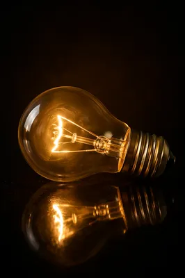 Glowing Vintage Light Bulb Idea Concept