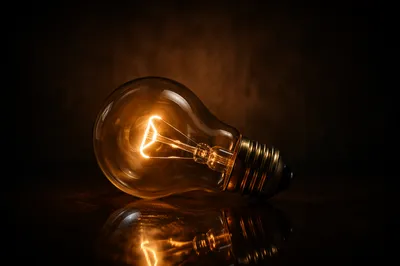 Glowing Vintage Light Bulb Idea Concept