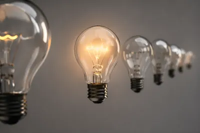 Glowing Light Bulb Innovation Concept