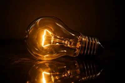 Glowing Vintage Light Bulb Innovation Concept