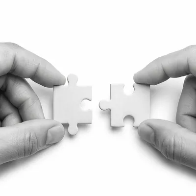 White Puzzle Pieces Teamwork Connection