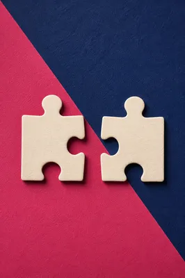 Abstract Puzzle Pieces for Teamwork Concept