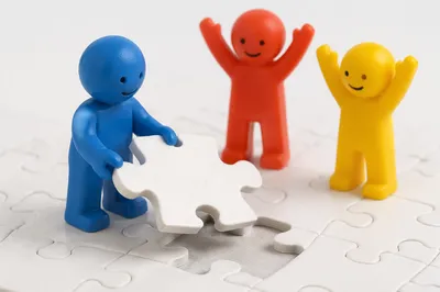 Teamwork Puzzle Piece Celebration