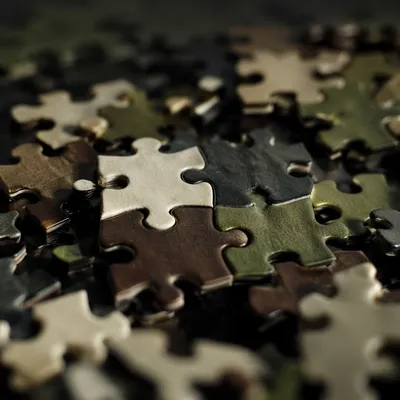 Interlocking Puzzle Pieces Symbolizing Teamwork