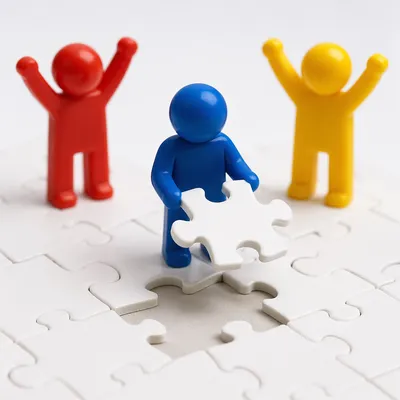 Teamwork Puzzle Completion With Celebrating Figures