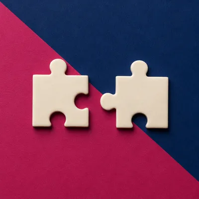 Puzzle Pieces Near Connection on Bold Background