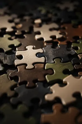 Interlocking Puzzle Pieces Symbolizing Teamwork