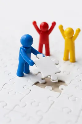 Teamwork Puzzle Piece Celebration