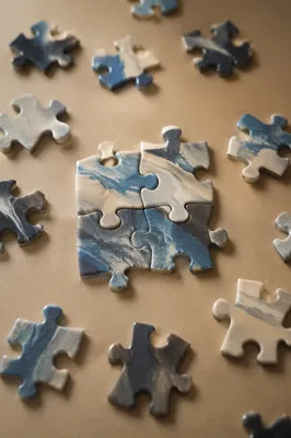 Puzzle Pieces Symbolizing Teamwork and Unity