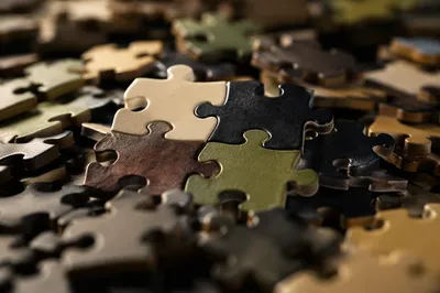 Interlocking Puzzle Pieces Symbolizing Teamwork