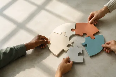 Hands Completing Puzzle Circle Together