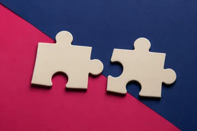Puzzle Pieces Near Connection for Teamwork