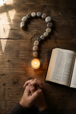 Prayerful Question Mark on Wooden Table