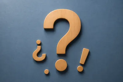 Wooden Question Mark on Slate Blue
