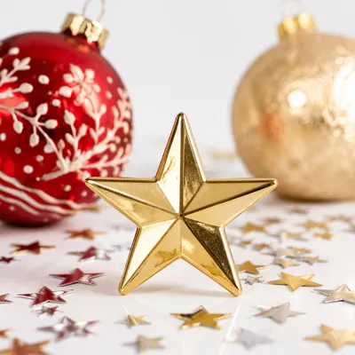 Shiny Gold Star With Festive Ornaments
