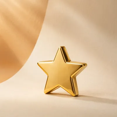 Shiny Gold Star Icon on Cream