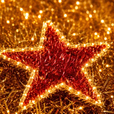 Radiant Red Star with Golden Lights