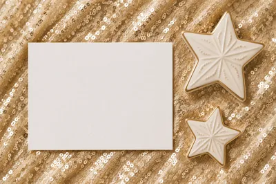 Golden Star Ornaments on Sequin Background