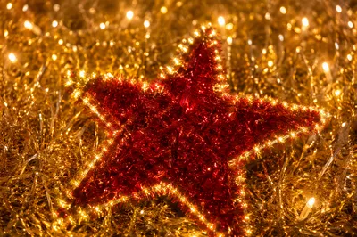 Golden Lit Red Star Decoration Closeup