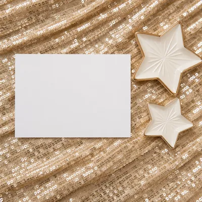 Gold Star Ornaments on Shimmering Background