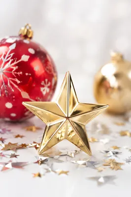 Shiny Gold Star Icon With Festive Ornaments