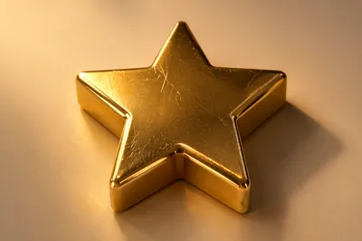 Shiny Gold Star Icon on Beige Surface
