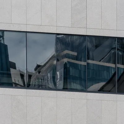 Abstract Modern Facade with Reflective Curves