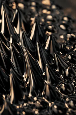Glossy Black Ferrofluid Spike Landscape