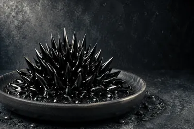Spiky Ferrofluid Sculpture on Dark Ceramic