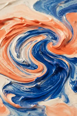 Ultramarine and Coral Paint Swirl Close-Up